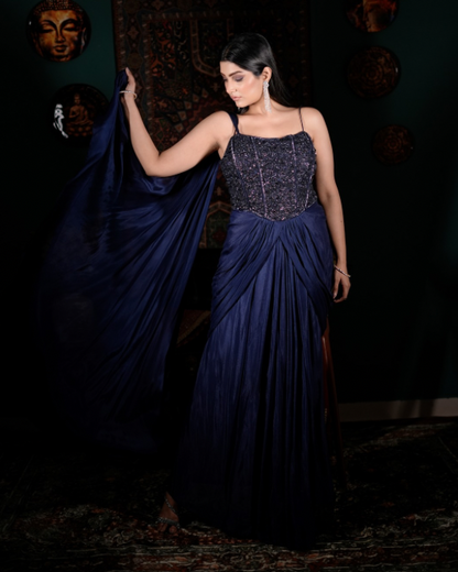 Elegant blue couture outfit, Handcrafted corset detailing, Premium Indo western collection, Modern wedding guest style, Fashionable festive outfit women, Draped crepe designer wear, Chic backless ethnic look, Glam fusion wear India, Luxury ethnic clothing, Indo western partywear