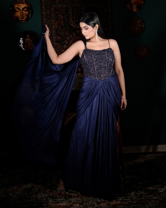 Elegant blue couture outfit, Handcrafted corset detailing, Premium Indo western collection, Modern wedding guest style, Fashionable festive outfit women, Draped crepe designer wear, Chic backless ethnic look, Glam fusion wear India, Luxury ethnic clothing, Indo western partywear