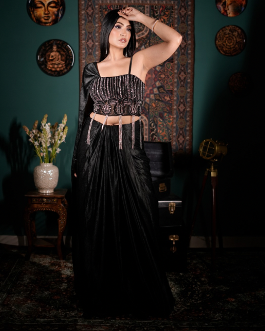 Elegant black couture outfit, Handcrafted crystal detailing, Chic Indo western ensemble, Modern ethnic glamour, Designer drape skirt look