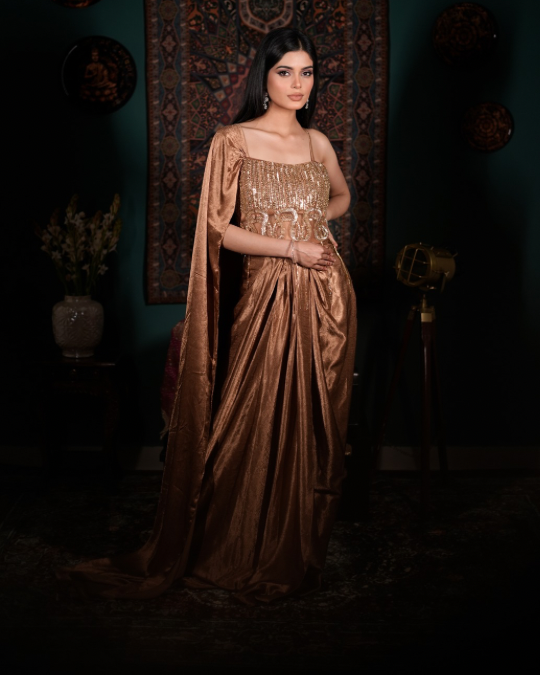 [Trending Indo western dress 2026, Celebrity inspired fusion wear, Attached dupatta blouse, Statement gold outfit, Luxury festive fashion]
