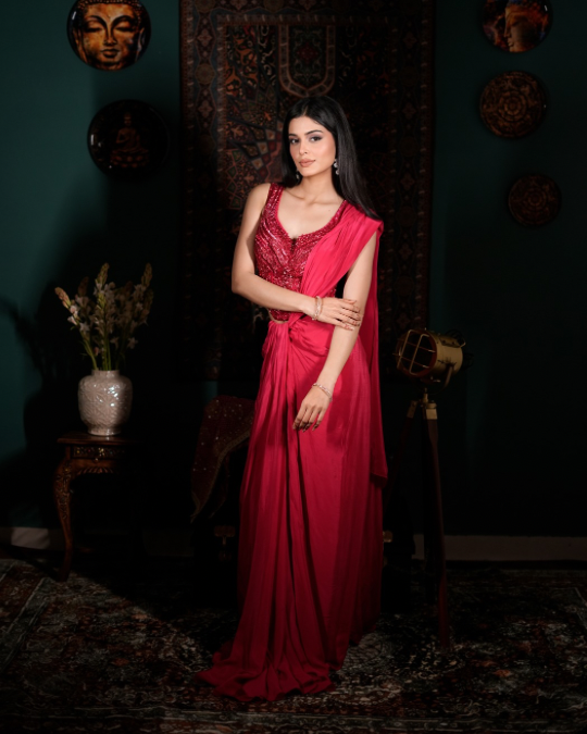 [Trending drape saree 2026, Celebrity inspired saree look, Red draped silhouette, Statement wedding guest outfit, Luxury fusion wear]