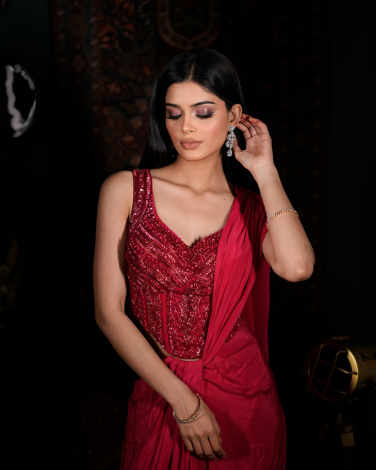 Elegant red couture saree, Handcrafted corset detailing, Premium Indo western collection, Chic drape saree outfit, Glam ethnic fashion India