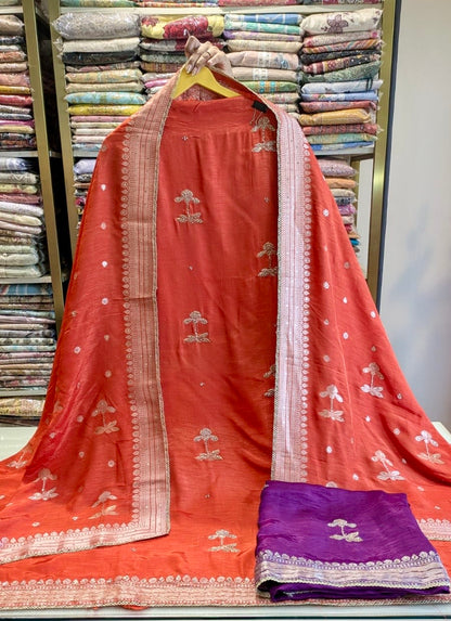 • Premium Dola Silk suit with Zari Booti and Dabka highlight design
• Elegant unstitched festive wear with Upara Silk bottom for women
• Designer Dola Silk dress material perfect for weddings and party wear
• Luxury ethnic suit with rich zari booti work and stylish dupatta
• Party wear Dola Silk suit with royal festive and traditional look