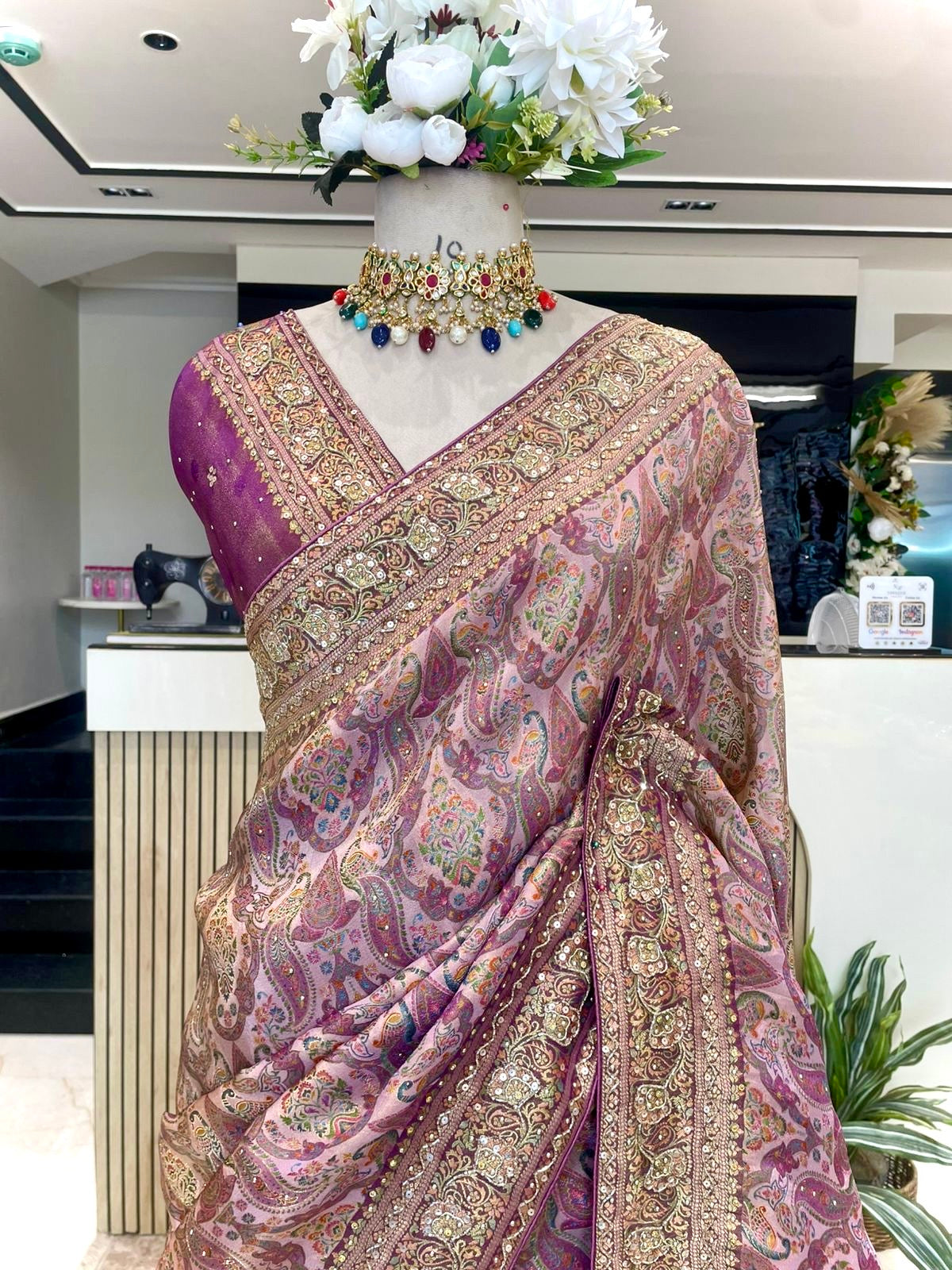 Graceful Modal Crape Saree with Position Print & Handwork