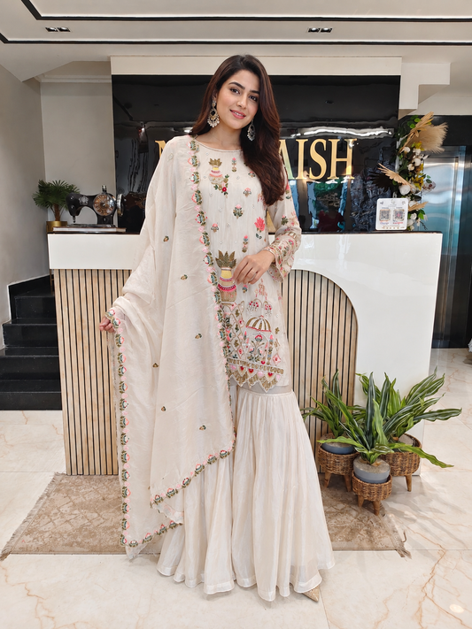 Off White Tissue Sharara Set
Designer Sharara Suit
Resham Zari Cutdana Work Sharara
Wedding Wear Sharara Set
Luxury Ethnic Wear