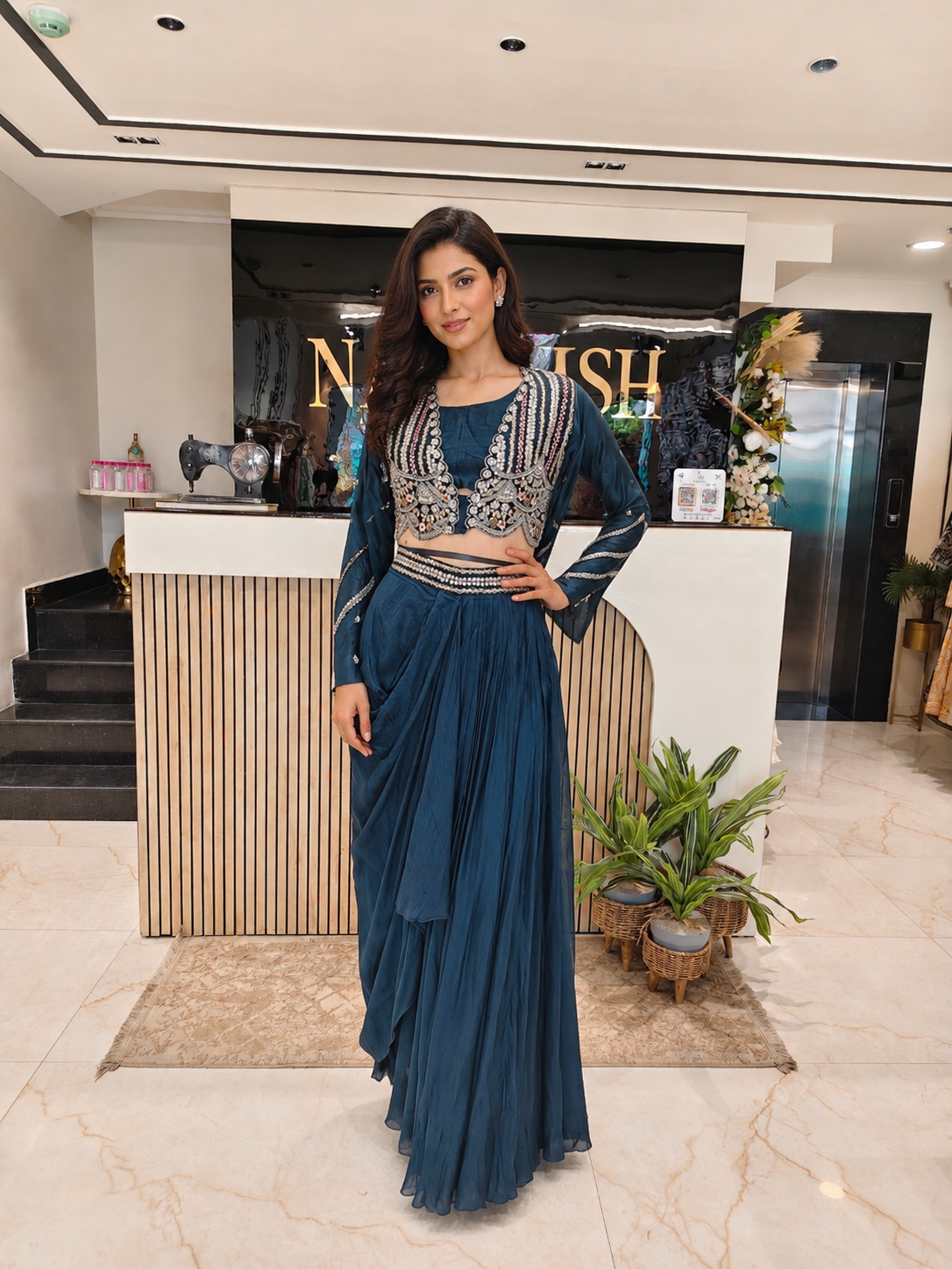 Teal Blue Indo Western Set
Designer Drape Skirt Outfit
Dabka Work Festive Wear
Fusion Party Wear India
Contemporary Wedding Wear Women