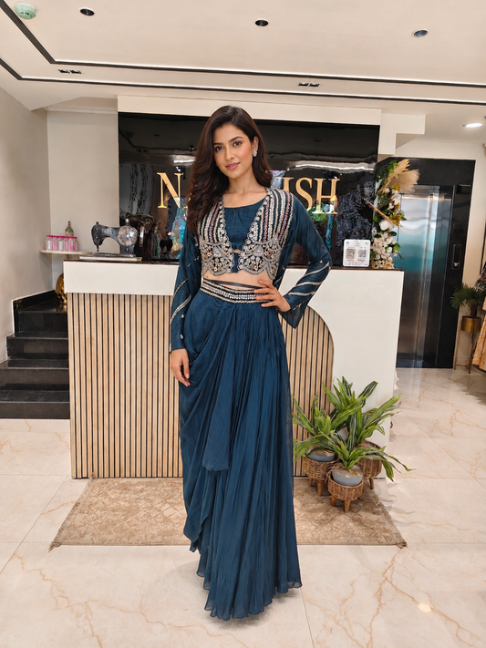 Teal Blue Indo Western Set
Designer Drape Skirt Outfit
Dabka Work Festive Wear
Fusion Party Wear India
Contemporary Wedding Wear Women