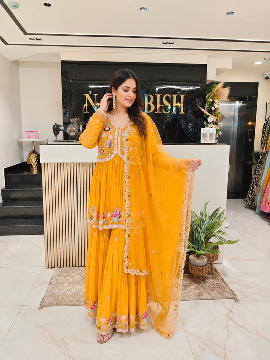 Mustard Peplum Sharara Set
Designer Chinon Sharara Suit
Wedding Wear Sharara
Festive Party Wear Sharara
Resham Work Ethnic Set