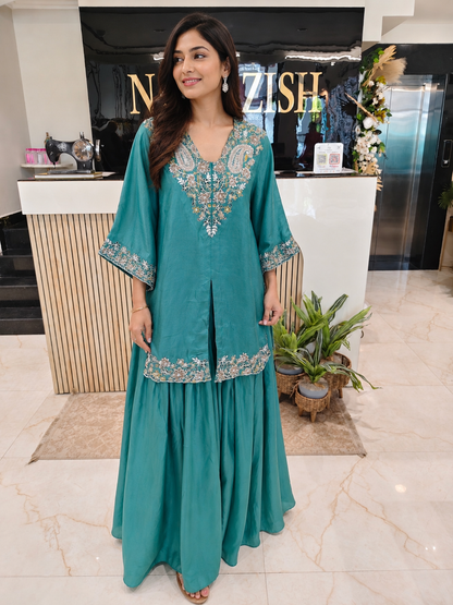 Sea Green Indo Western Set
Designer Skirt Set India
Kutdana Dabka Work Outfit
Fusion Wedding Wear Women
Contemporary Festive Wear India