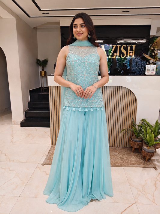 Sky Blue Net Indo-Western Set
Designer Kurta Palazzo Set
Cutdana Mirror Work Indo-Western
Wedding Wear Net Outfit
Luxury Ethnic Wear