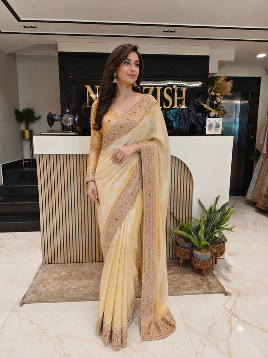 Gold Tissue Saree
Designer Tissue Saree
Handwork Wedding Saree
Kundan Mirror Work Saree
Luxury Festive Saree