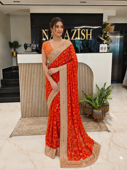 Orange Designer Georgette Saree
Handwork Wedding Saree for Women
Kutdana Kundan Work Saree
Party Wear Georgette Saree
Luxury Festive Saree India