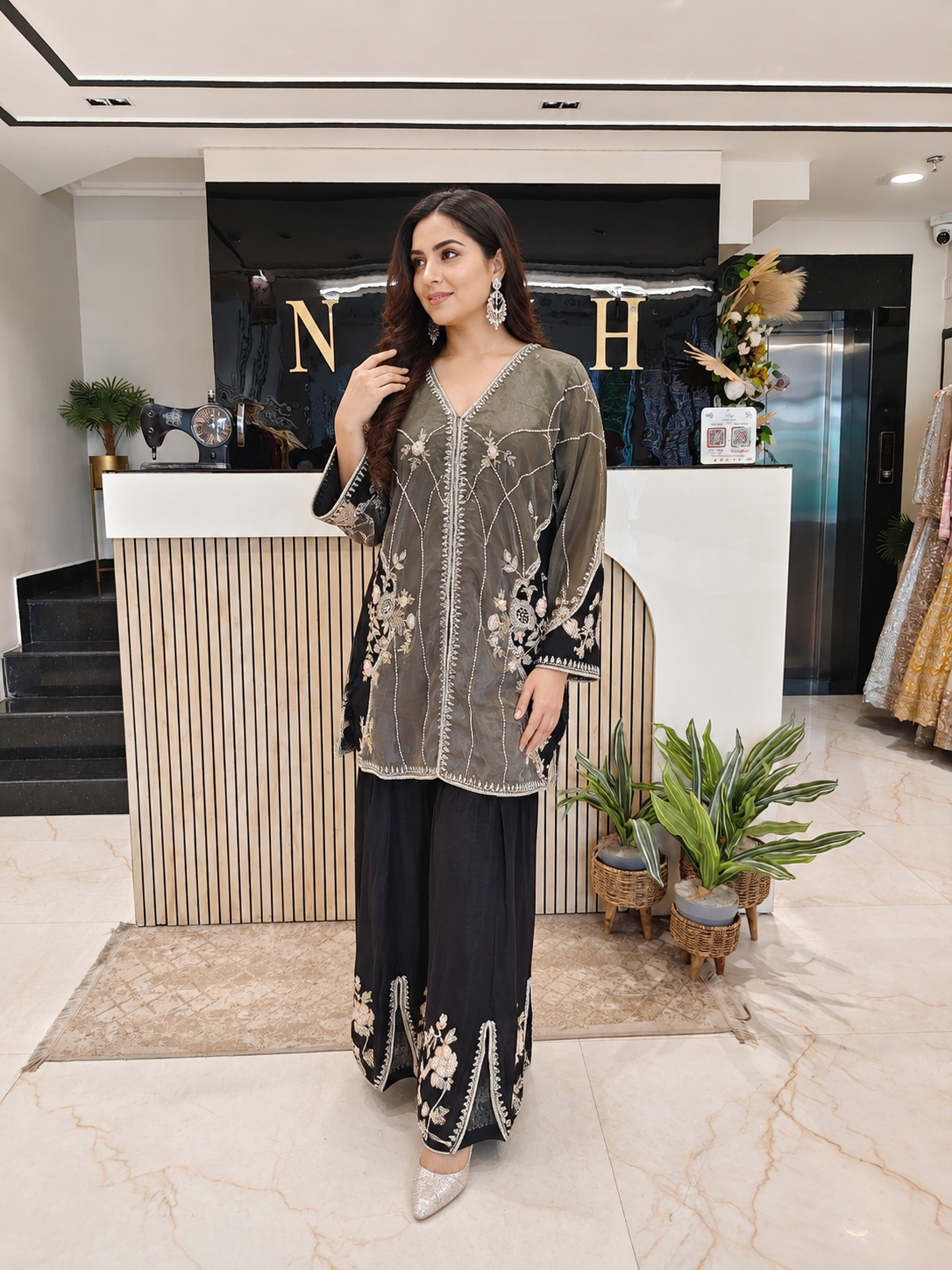 Grey & Black Glass Tissue Indo-Western Set
Designer Glass Tissue Kurta Set
Cutdana Dabka Work Indo-Western
Tulip Pants Party Wear Outfit
Luxury Ethnic Wear
