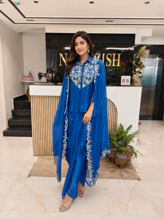 Blue Indo Western Set
Designer Drape Skirt Outfit
Fusion Party Wear India
Sequins Work Festive Wear
Contemporary Wedding Wear Women