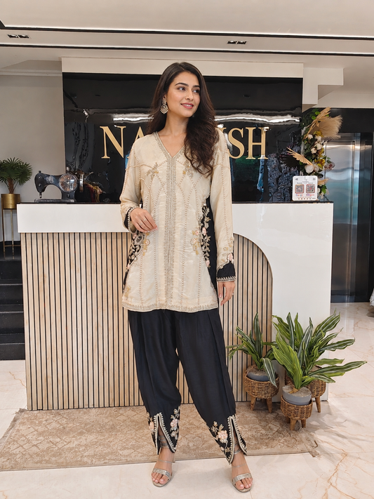 Cream & Black Tissue Indo-Western Set
Designer Tissue Kurta Set
Cutdana Dabka Work Indo-Western
Tulip Pants Party Wear Outfit
Luxury Ethnic Wear