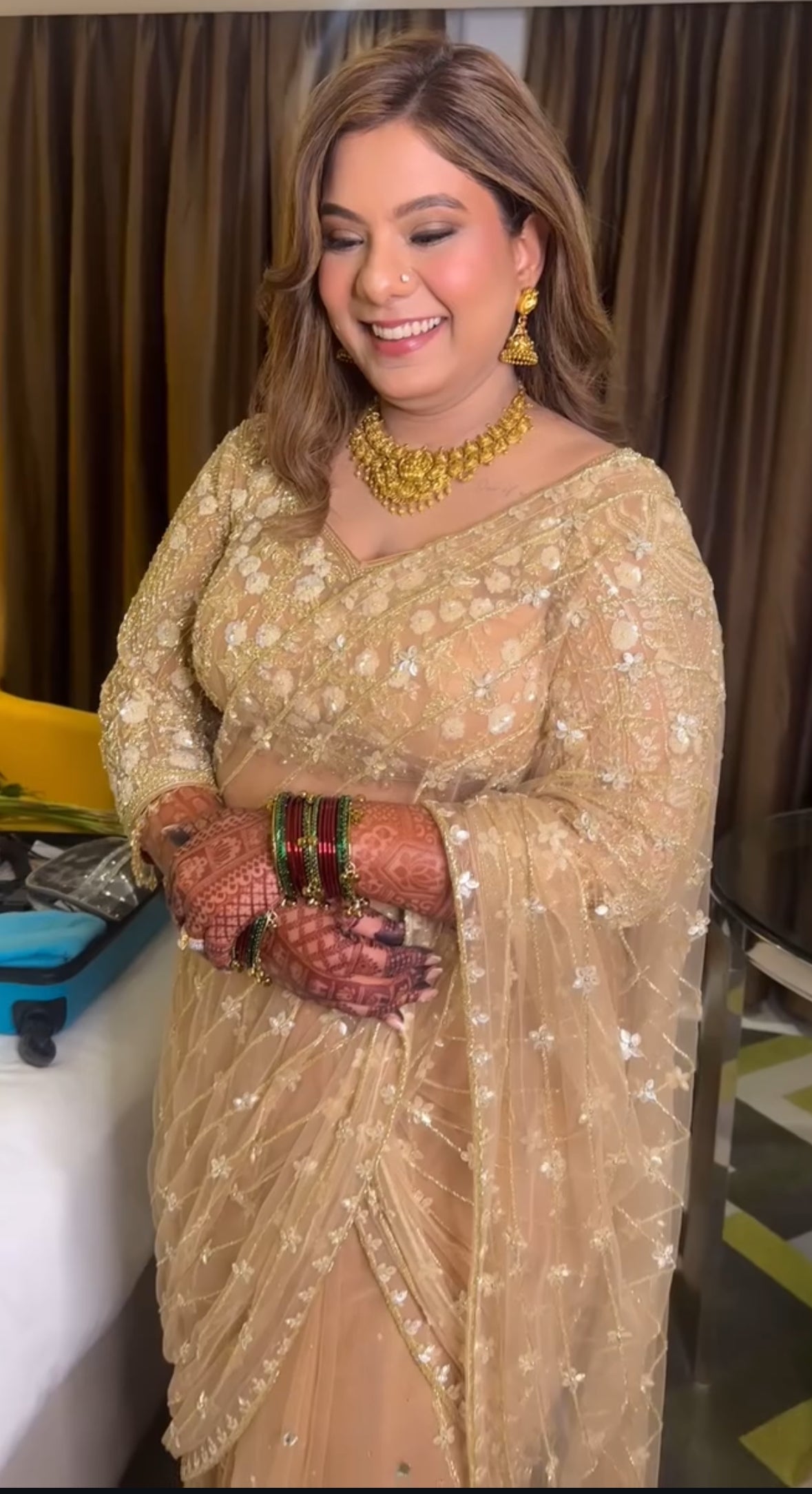 A showstopper for the modern bride—this champagne gold draped sari from Nawazish is the epitome of elegance and opulence. Heavily embellished with intricate handwork and crafted in a pre-draped silhouette, it combines the ease of wear with the grandeur of couture.

Designed to make a statement at your engagement, cocktail, or reception, this bridal drape is a perfect blend of tradition and trend. At Nawazish, we bring bridal dreams to life with luxurious fabrics, exquisite detailing, and silhouettes that celebrate every bride’s individuality.