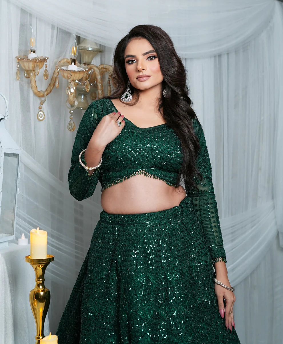 Shine bright in our blingy and stylish lehengas, crafted for your sangeet and cocktail celebrations. Featuring luxurious sequins, modern cuts, and eye-catching silhouettes, these lehengas redefine festive fashion. Glamorous, bold, and unforgettable—Nawazish has the perfect statement lehenga for your big night.