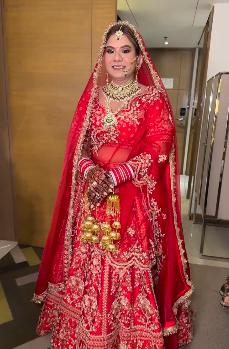 Our radiant bridal client brings Nawazish couture to life in this handcrafted bridal lehenga, designed with love, tradition, and the finest detailing. Featuring intricate hand embroidery, luxurious fabric, and timeless craftsmanship, this masterpiece reflects the heart of Nawazish—where every bride’s story is woven into every stitch.
From regal reds to soft pastels, our bridal lehengas are crafted to celebrate the individuality of every bride, both in India and across the globe. Explore our Client Diaries to see real brides shine in Nawazish creations made for memories.
