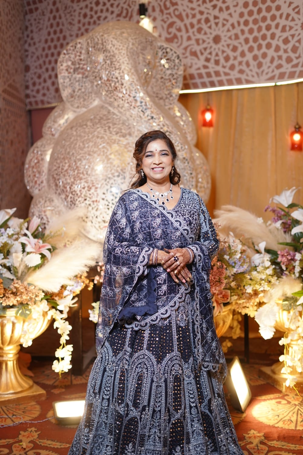 From grace to grandeur—our beautiful client, the mother of the groom, shines in a Nawazish lehenga that blends timeless elegance with luxurious hand embroidery. Thoughtfully designed for women who want to celebrate tradition with sophistication, this look is proof that Nawazish isn't just for brides—it's for every woman who deserves to feel extraordinary.
Explore our Client Diaries, where real moments meet couture craftsmanship and every outfit tells a story of love, pride, and celebration.