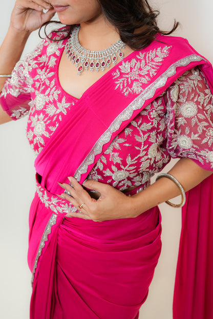 Bold in pink drape saree