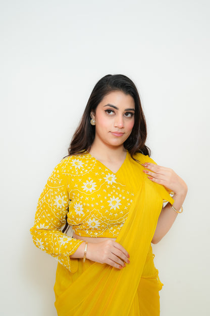 Bright yellow drape saree